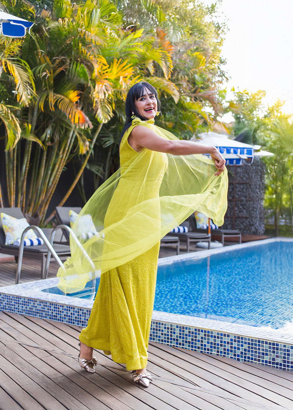 Lime fitted dress with tulle cape