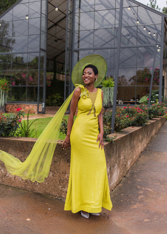 Lime fitted dress with tulle cape